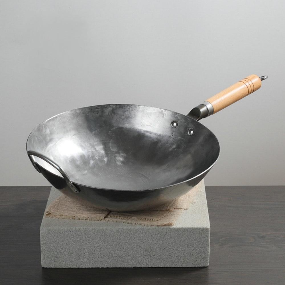 http://toroscookware.com/cdn/shop/products/large-traditional-chinese-handmade-iron-wok-with-loop-handle-121560_1200x1200.jpg?v=1599407133