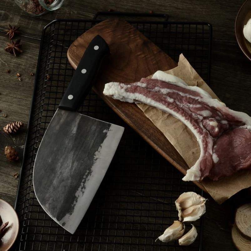 https://toroscookware.com/cdn/shop/products/67-handmade-full-tang-high-carbon-clad-steel-cleaver-knife-with-leather-sheath-992226_1024x1024.jpg?v=1599406874