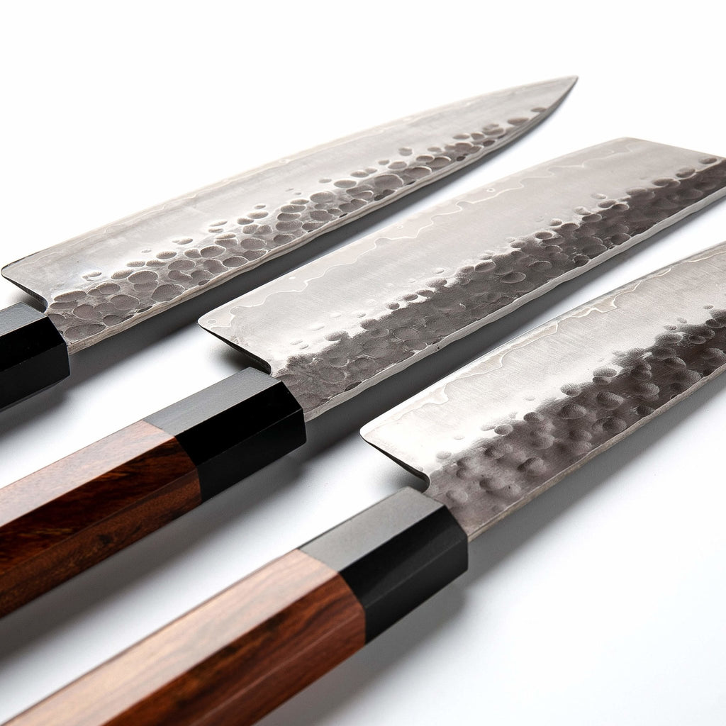 https://toroscookware.com/cdn/shop/products/67-japanese-handmade-nakiri-knife-aus10-three-layered-steel-wooden-handle-446352_1024x1024.jpg?v=1599406876