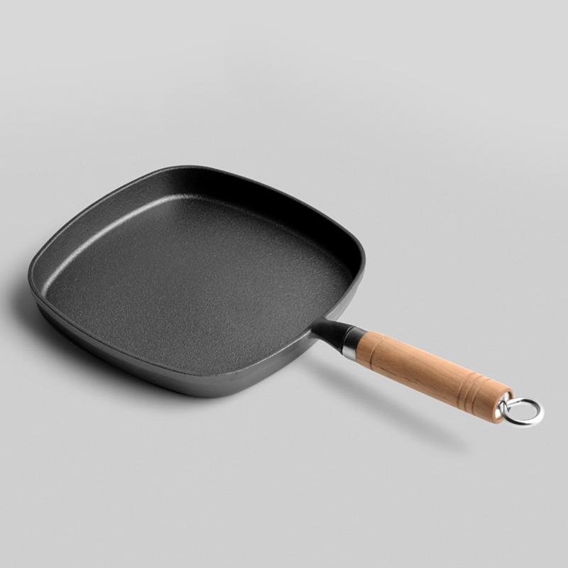 https://toroscookware.com/cdn/shop/products/8-inch-thickened-non-stick-cast-iron-grill-pan-with-wooden-handles-378227_1024x1024.jpg?v=1599407060