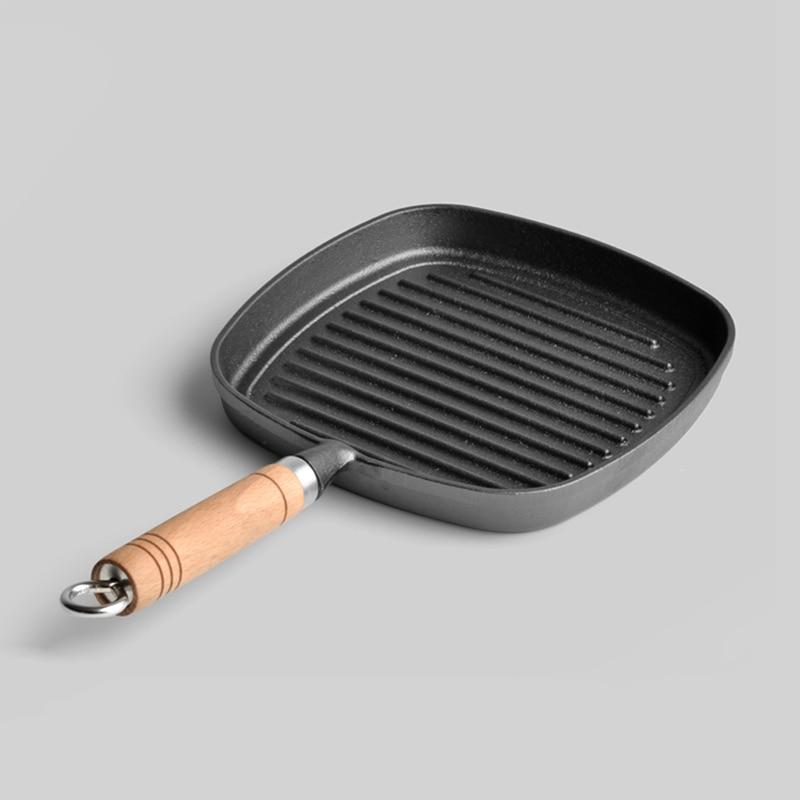 https://toroscookware.com/cdn/shop/products/8-inch-thickened-non-stick-cast-iron-grill-pan-with-wooden-handles-830850_1024x1024.jpg?v=1599407060