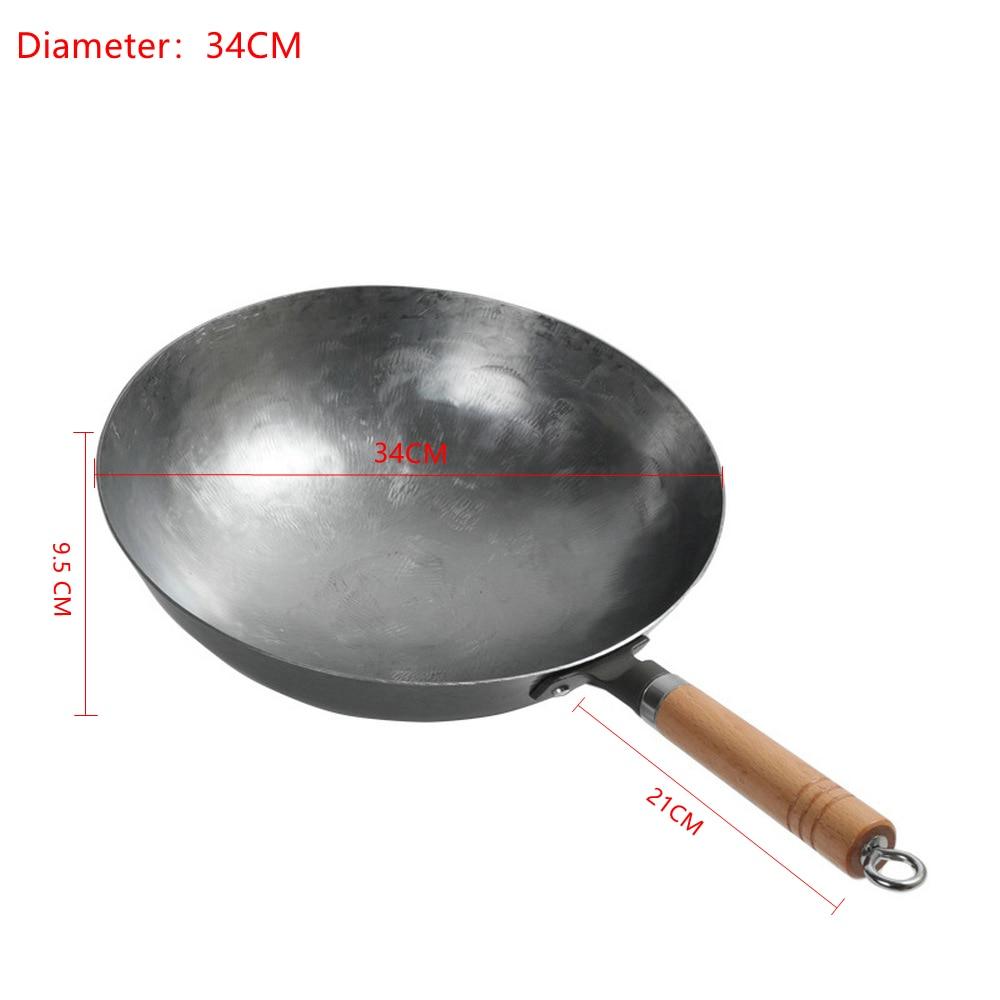 https://toroscookware.com/cdn/shop/products/large-traditional-chinese-handmade-iron-wok-with-loop-handle-533102_1024x1024.jpg?v=1599407133